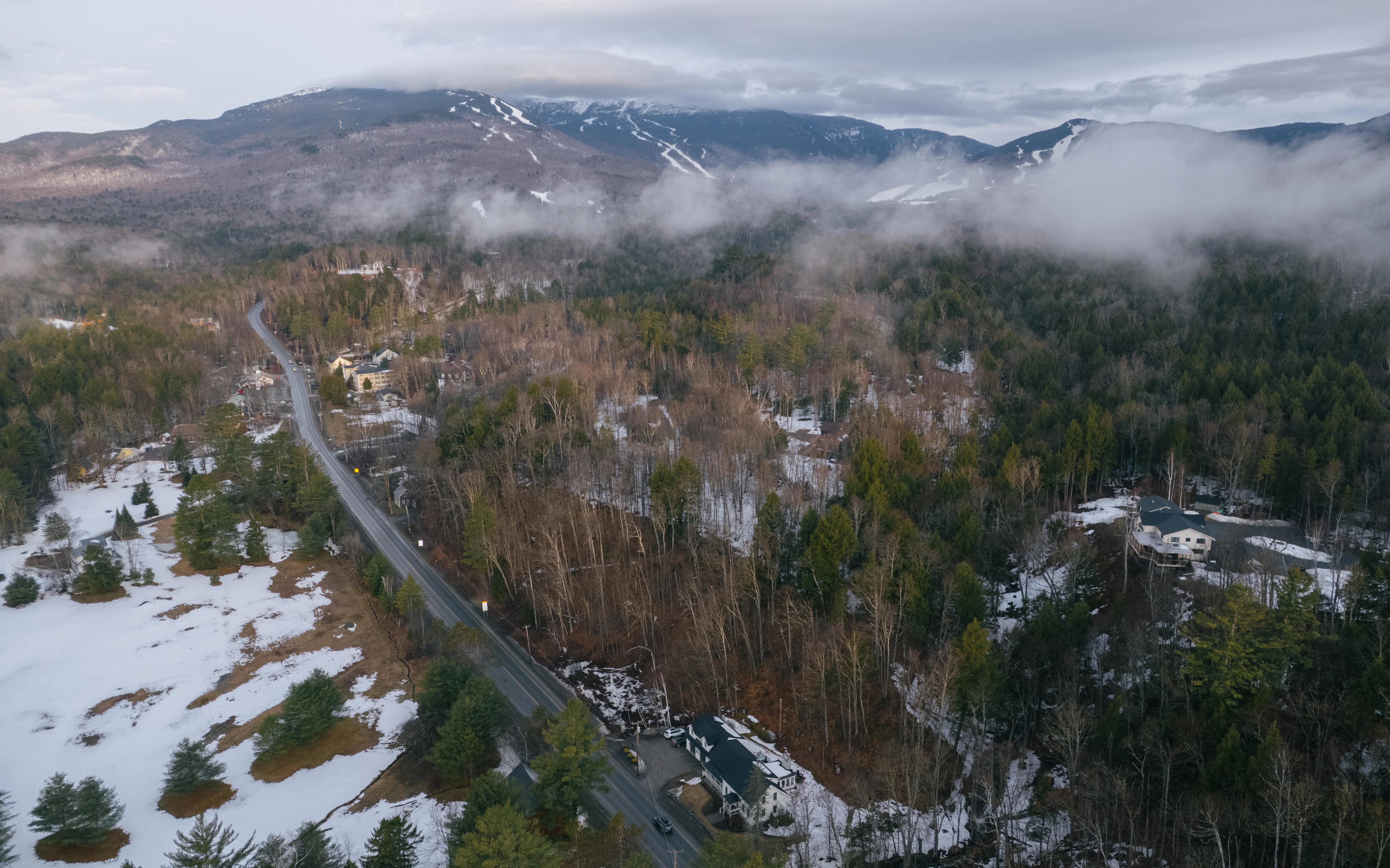 Aerial view of Mile Away Stowe farmhouse and property grounds